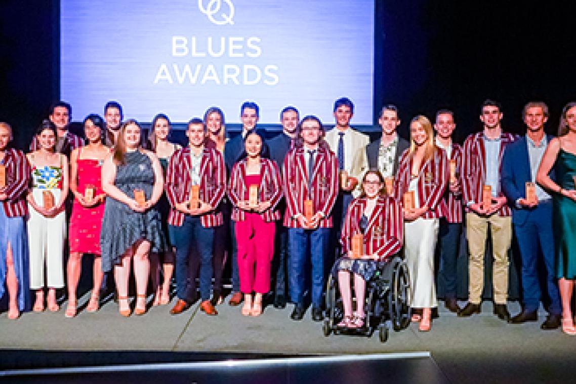 Group of people standing on stage