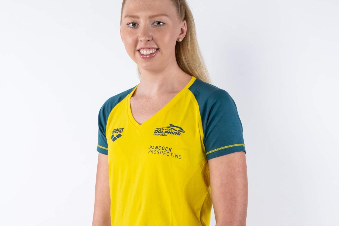 Lakeisha Patterson standing in front of a white backdrop, wearing an Australian uniform