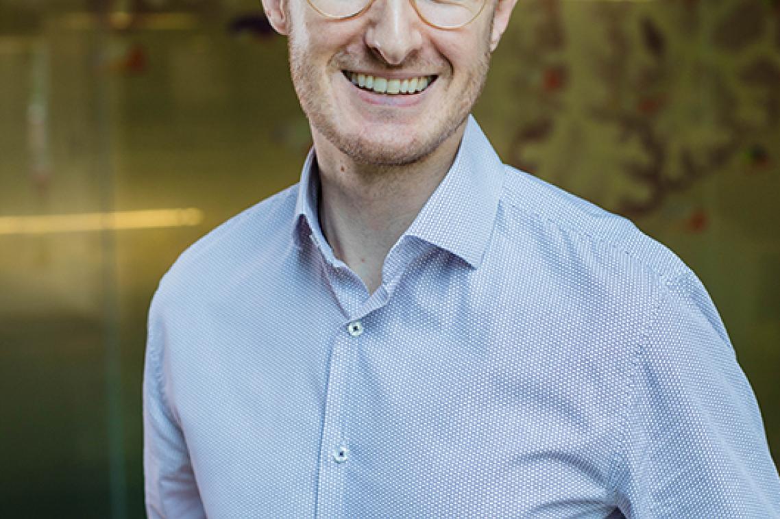 A man in a blue shirt