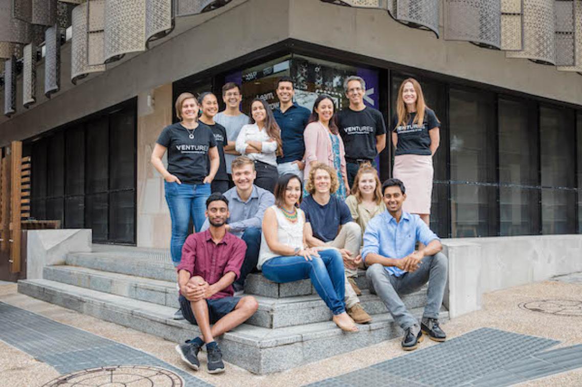 Ventures ilab Accelerator 2021 cohort sitting on the steps at UQ's St Lucia campus.