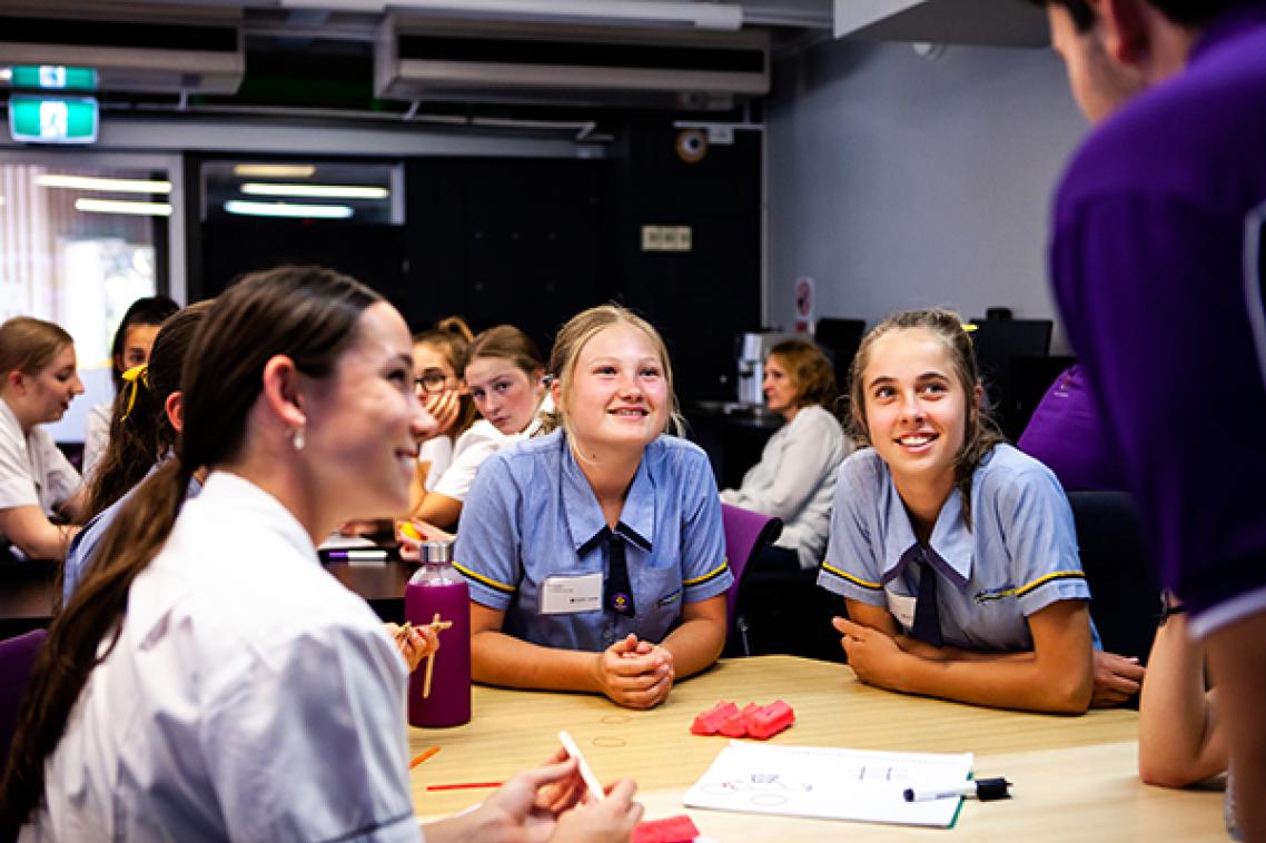 A group of young women attending a Women in Engineering event.