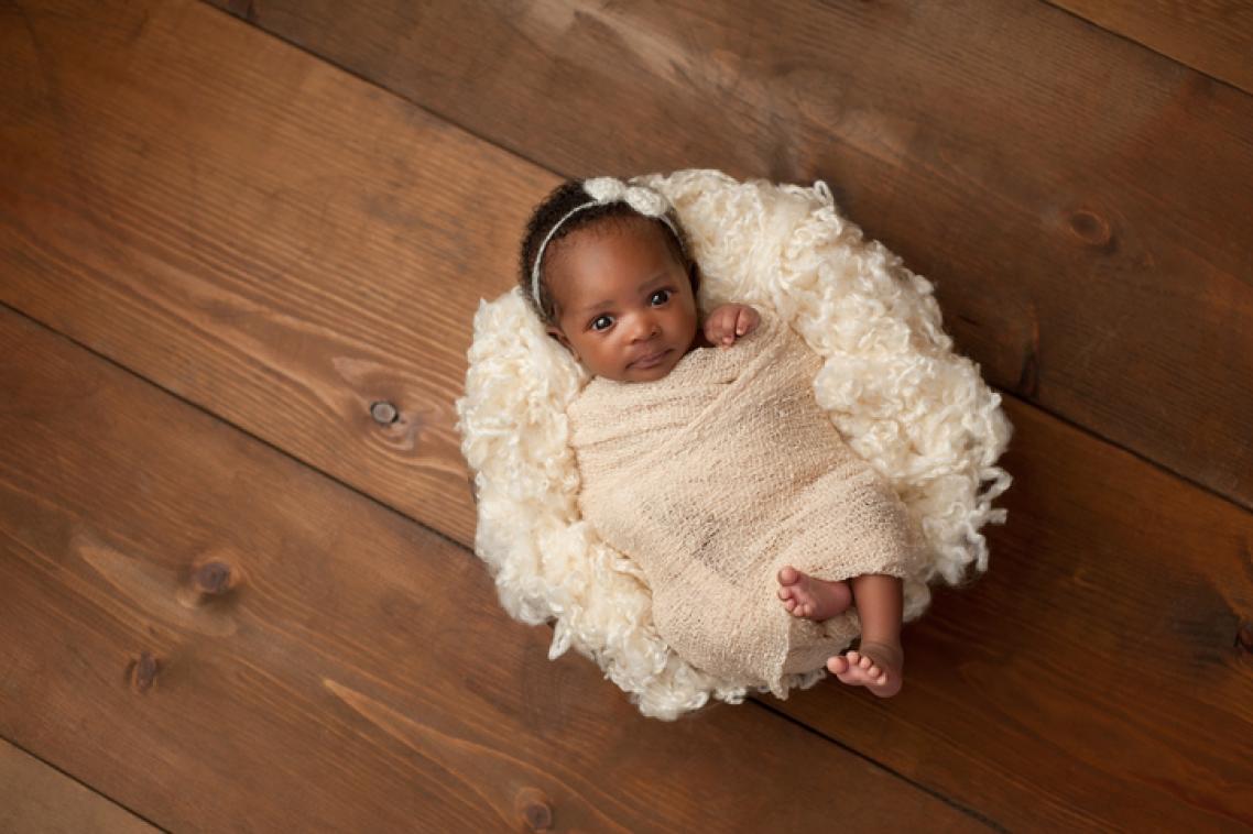 The research suggests that humans' experiences early in life may affect their brain activity later. iStockphoto.