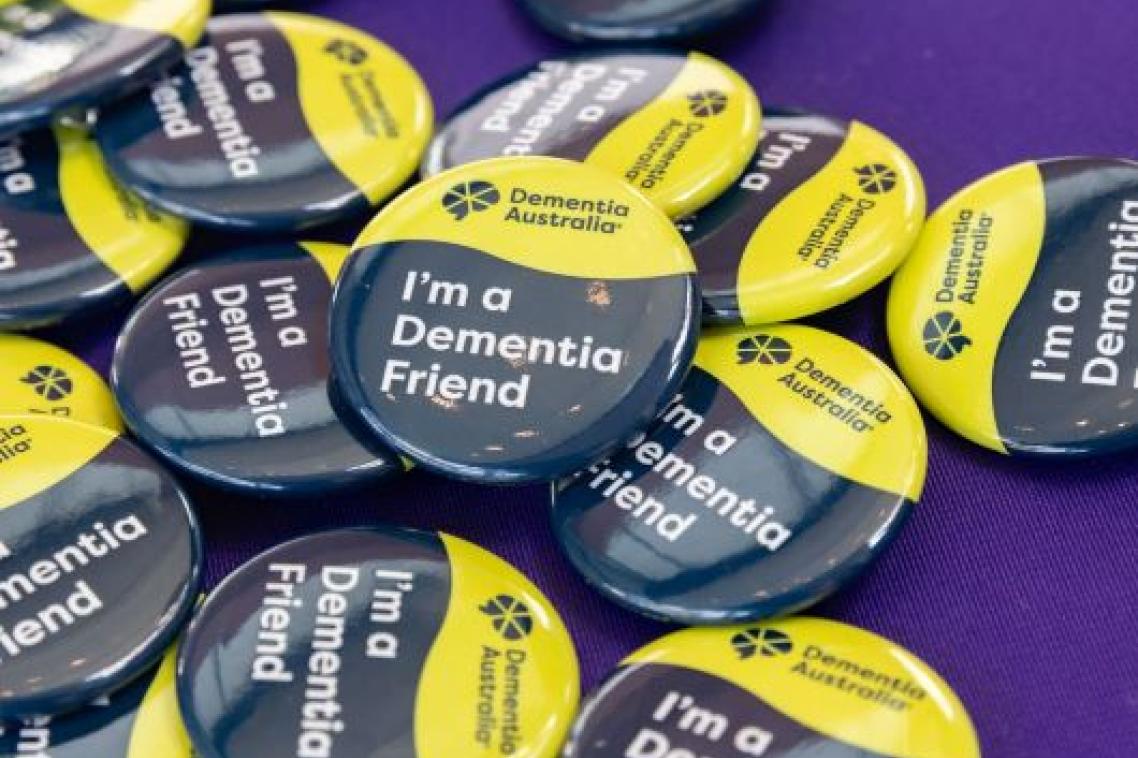 Close up of a button that says 'I'm a dementia friend'