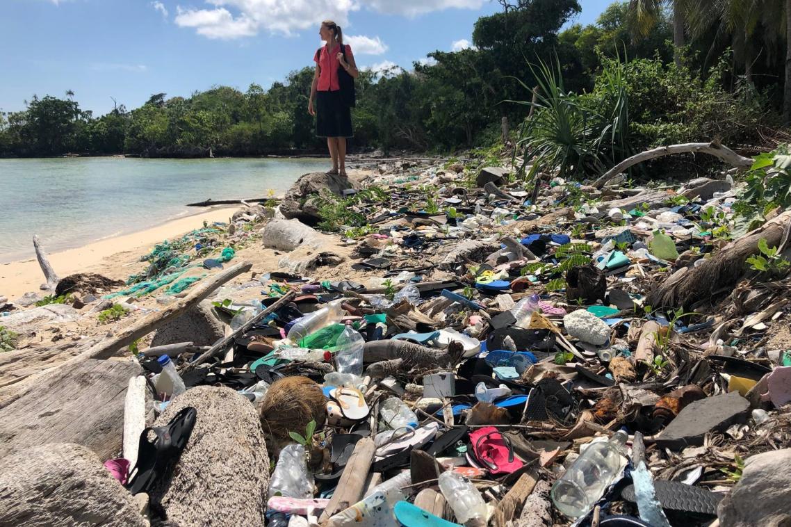 Beach littered with plastic waste