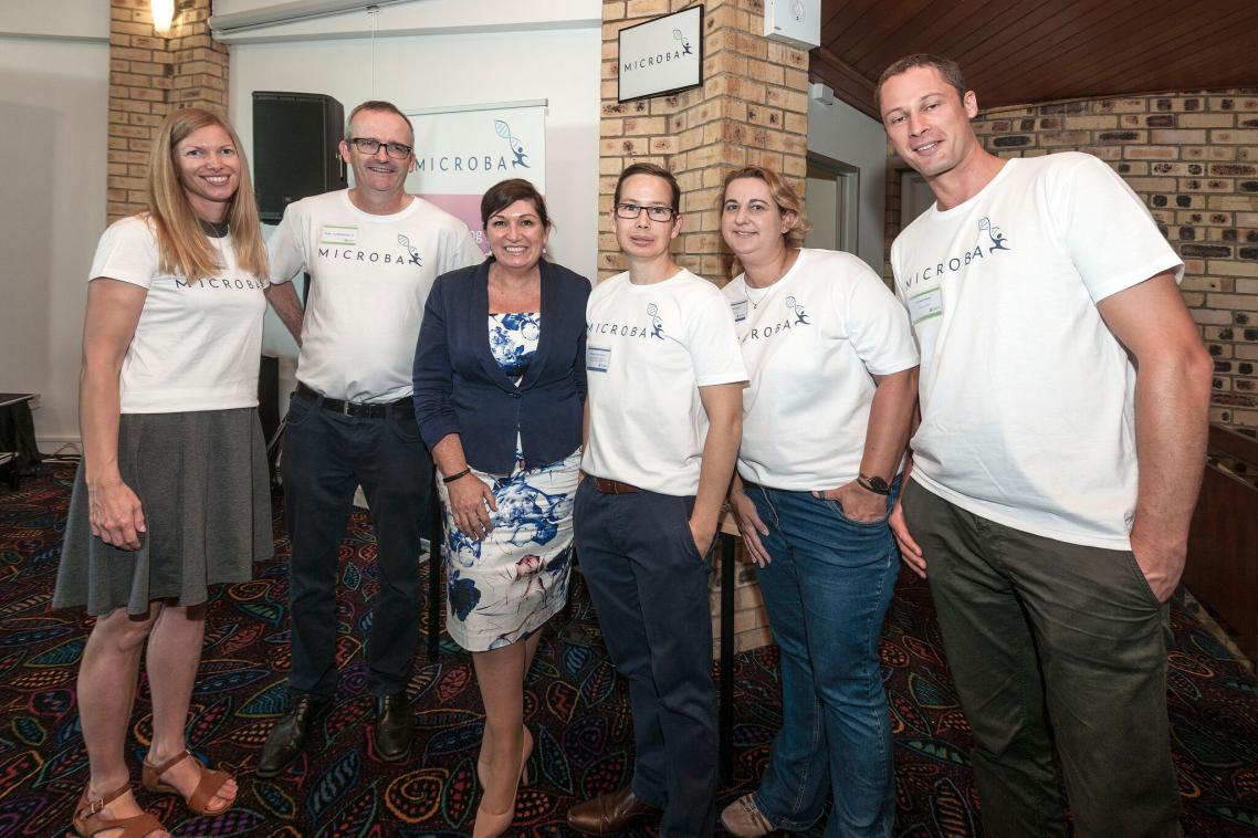 Minister for Innovation, Science and the Digital Economy and Minister for Small Business Leeanne Enoch with team members from Microba