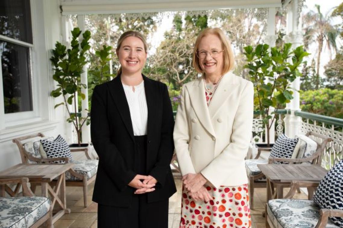 Two women smiling at the camera