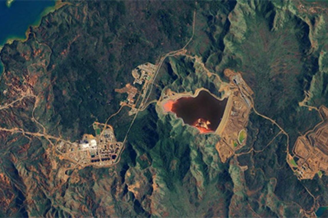 a satellite image of a nickel mine surrounded by trees