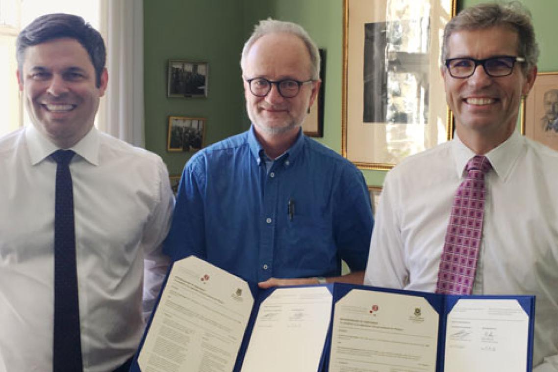 From left, Australian Ambassador to Denmark Damian Miller; Niels Bohr Institute director Professor Robert Krarup Feidenhans'l; UQ Vice-Chancellor Professor Peter Høj