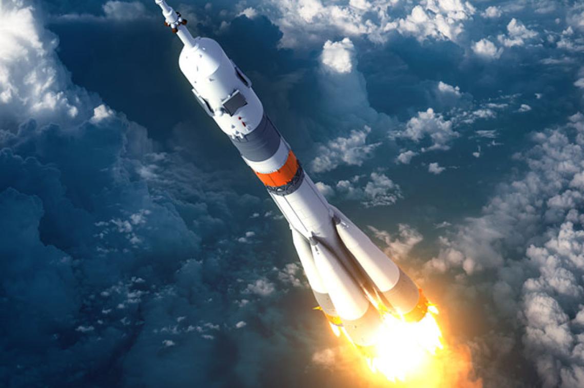 A rocket flying through the sky