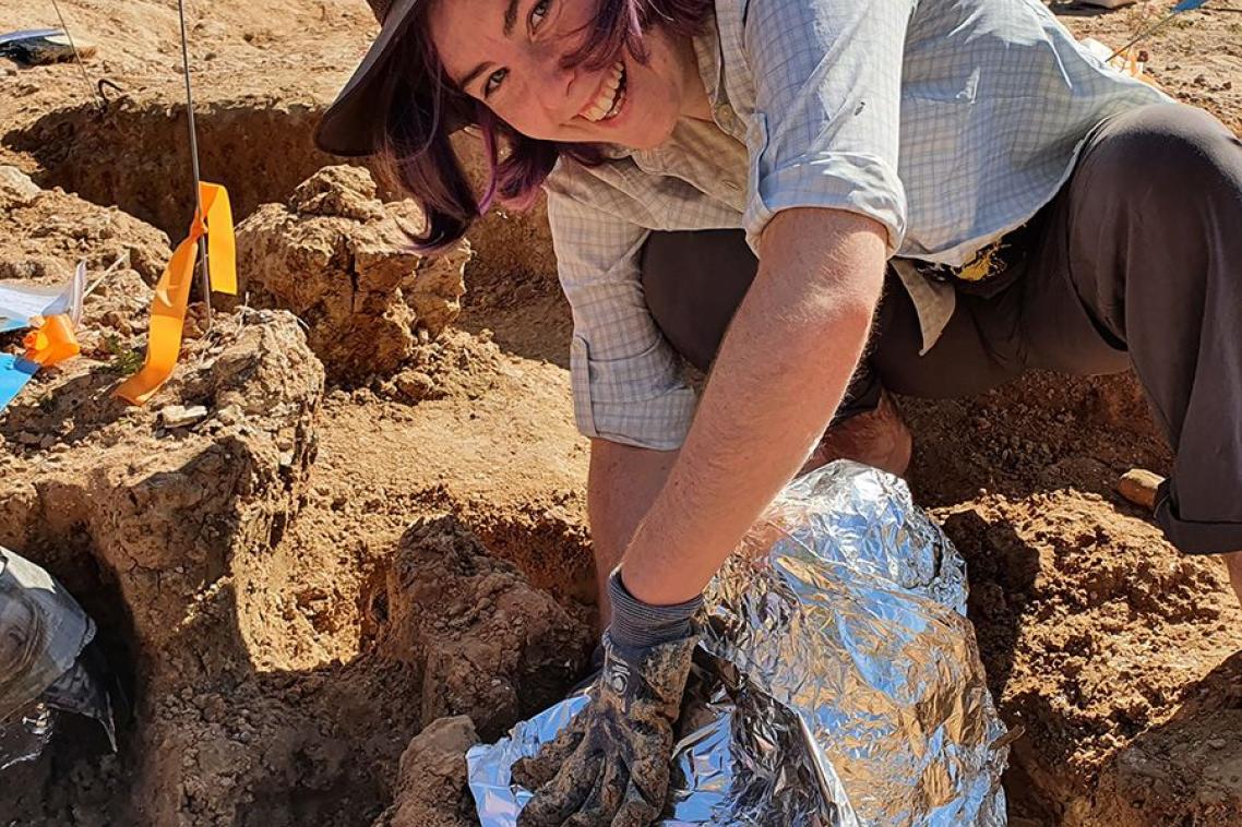 Nellie Pease at a fossil site in Western Queensland