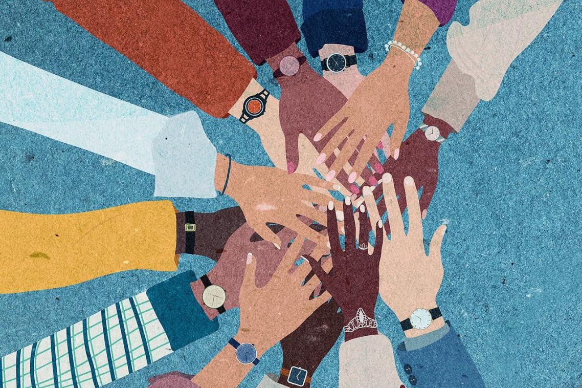 Women's hands supporting each other